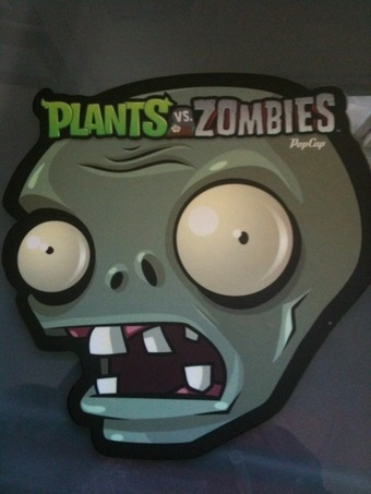 Illustration for article titled Plants Vs. Zombies Attack Your Desk, Phone